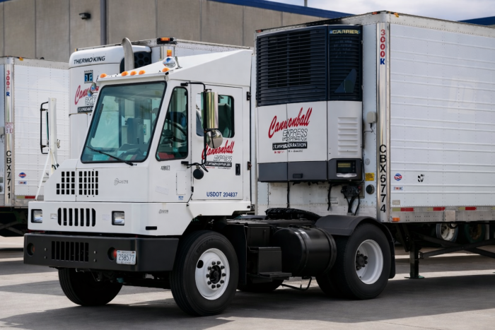 Clean terminal tractor with refrigerated trailers